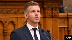Hungary's incoming Prime Minister Peter Magyar delivers a speech during his swearing-in ceremony at the Hungarian parliament in Budapest on May 9, 2026.