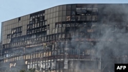 Smoke billows from the IRS building in Austin, Texas.