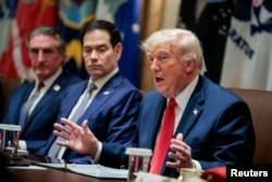 US President Donald Trump participates in a cabinet meeting at the White House on May 27.