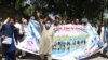 Afghans shout slogans during a protest against the Iranian regime and demand justice for Afghans allegedly killed by the Iranian security forces, in Jalalabad, on June 8.