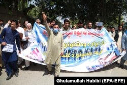 Afghans rally in Jalalabad on June 8 to demand justice for the migrants allegedly killed by Iranian security forces.