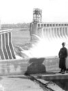 German soldiers stand by the Dnieper Hydroelectric Station, which was blown up by the Soviet military on August 18, 1941.