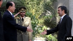 Iranian President Mahmud Ahmadinejad (right) greets North Korea's ceremonial head of state, Kim Yong Nam, in Tehran earlier this year. 