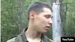 Kazakh border guard Vladislav Chelakh in a still from a YouTube video clip