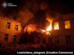 A fire burns at a medical facility hit by a Russian strike in Ukraine's Sumy region on March 19.