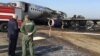 RUSSIA -- Chairman of Russia's Investigative Committee Aleksandr Bastrykin (L) visits the scene of an incident involving an Aeroflot Sukhoi Superjet 100 passenger plane at Moscow's Sheremetyevo airport, May 6, 2019