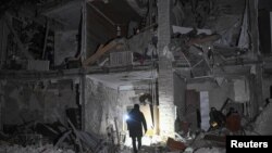 Srušena stambena zgrada nakon ruskog raketnog napada, Zaporožje, Ukrajina, 23. januara 2025. 