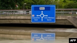 Një rrugë e përmbytur në Zvicër. 30 qershor 2024. 