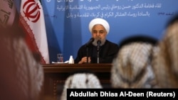 Iranian President Hassan Rouhani is seen during a meeting with tribal leaders in Karbala, Iraq, March 12, 2019. 