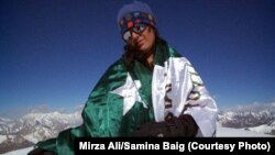 Pakistani climber Samina Baig poses on the top of Chashkin Sar (6,400 meters) in Pakistan. (file photo)