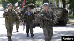 Вооруженные пророссийские сепаратисты в Донецкой области Украины. 20 июля 2015 года.