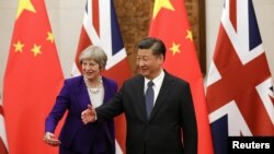 Theresa May i Xi Jinping 