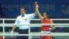 Tajik boxer Mavzuna Chorieva is shown after a victory in the Asian Games in South Korea in 2014.