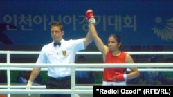 Tajik boxer Mavzuna Chorieva defeated Ayako Minova from Japan in1st raund of women boxing competition in Asian Games, South Kore, 27.09.2014