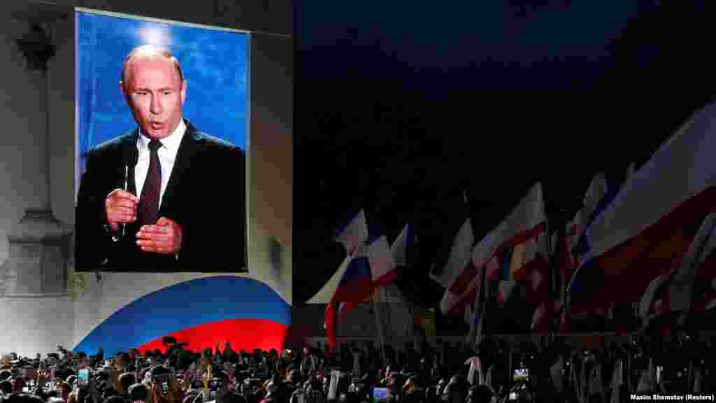 Президент Росії Володимир Путін виступив перед аудиторією під час мітингу в Севастополі, присвяченого четвертій річниці анексії Криму Росією