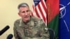 FILE: John Nicholson, the top American commander in Afghanistan, speaks to reporters at Bagram air base north of Kabul in March.