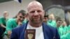 RUSSIA -- American mixed martial artist Jeff Monson poses with his Russian passport in Patriot Park, Moscow Region, June 12, 2018