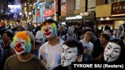 Участники протестов в Гонконге.
