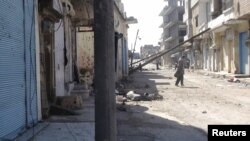 A photo from early February of a row of houses that residents said were damaged during a military crackdown on protesters, in Rasten, near Homs.