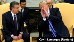 U.S. -- U.S. President Donald Trump gestures during his meeting with Uzbek President Shavkat Mirziyoev at the White House in Washington. May 16, 2018