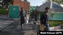 Afghans deported from Germany arrive at the international airport in Kabul in September 2017. 