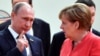 German Chancellor Angela Merkel (right) talks to Russian President Vladimir Putin at the start of the first working session of the G20 meeting in Hamburg in July 2017.