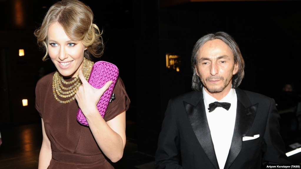 Umar Dzhabrailov (right) attends a concert with TV personality Ksenia Sobchak in Moscow in February 2012.