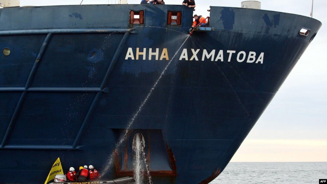 Greenpeace activists attach themselves to the anchor of the Russian passenger ship, "Anna Akhmatova," in the Barents Sea on August 27.