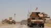 An Afghan National Army patrol in Helmand's Nad-e Ali distrcit on September 11, 2019