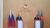 Главы МИД России и Азербайджана, Сергей Лавров (слева) и Джейхун Байрамов, на пресс-конференции в Москве, 23 декабря 2022 г. 