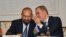 Azerbaijani Foreign Minister Jeyhun Bayramov whispers in the ear of his Armenian counterpart, Ararat Mirzoyan, during a meeting about the Trump Route for International Peace and Prosperity in New York on September 23, 2026.
