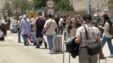 Iran / Armenia - people leaving Iran via the Agarak border crossing with Armenia as conflict with Israel continues - screen grab 1
