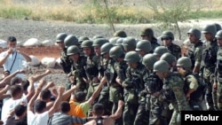 Armenia -- Troops practice a peacekeeping operation on August 12, 2009.