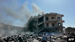 The aftermath of an Israeli air strike in Lebanon.