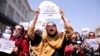 AFGHANISTAN -- Afghan women's rights defenders and civil activists protest to call on the Taliban for the preservation of their achievements and education, in front of the presidential palace in Kabul, Afghanistan September 3, 2021. REUTERS/Stringer T