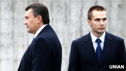 Viktor Yanukovych (left) and his son Oleksandr (file photo)