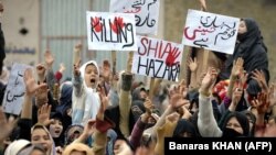 Shi'ite Muslims protest on February 18 against a bombing that killed 89 people in Quetta two days earlier. Some are questioning if the authorities are able, or even willing, to stop those behind it and other attacks.