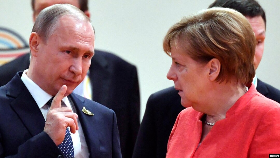 According to the Kremlin. Vladimir Putin (left) made his latest proposal in a phone conversation with German Chancellor Angela Merkel. (file photo)