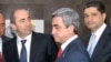 Armenia - Outgoing President Robert Kocharian (L), President-elect Serzh Sargsyan (C) and Central Bank Chairman Tigran Sarkisian attend the inauguration of a commercial bank headquarters in Yerevan, 4Apr2008.