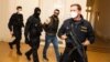 The Prague City Court ruled there wasn't enough evidence to prove the involvement of Aleksandr Franchetti (shown arriving at a hearing in September 2021) in organizing a criminal group and the illegal incarceration of 11 pro-Ukrainian residents of Crimea.