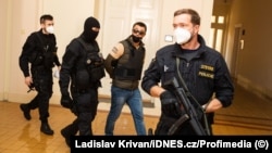 The Prague City Court ruled there wasn't enough evidence to prove the involvement of Aleksandr Franchetti (shown arriving at a hearing in September 2021) in organizing a criminal group and the illegal incarceration of 11 pro-Ukrainian residents of Crimea.