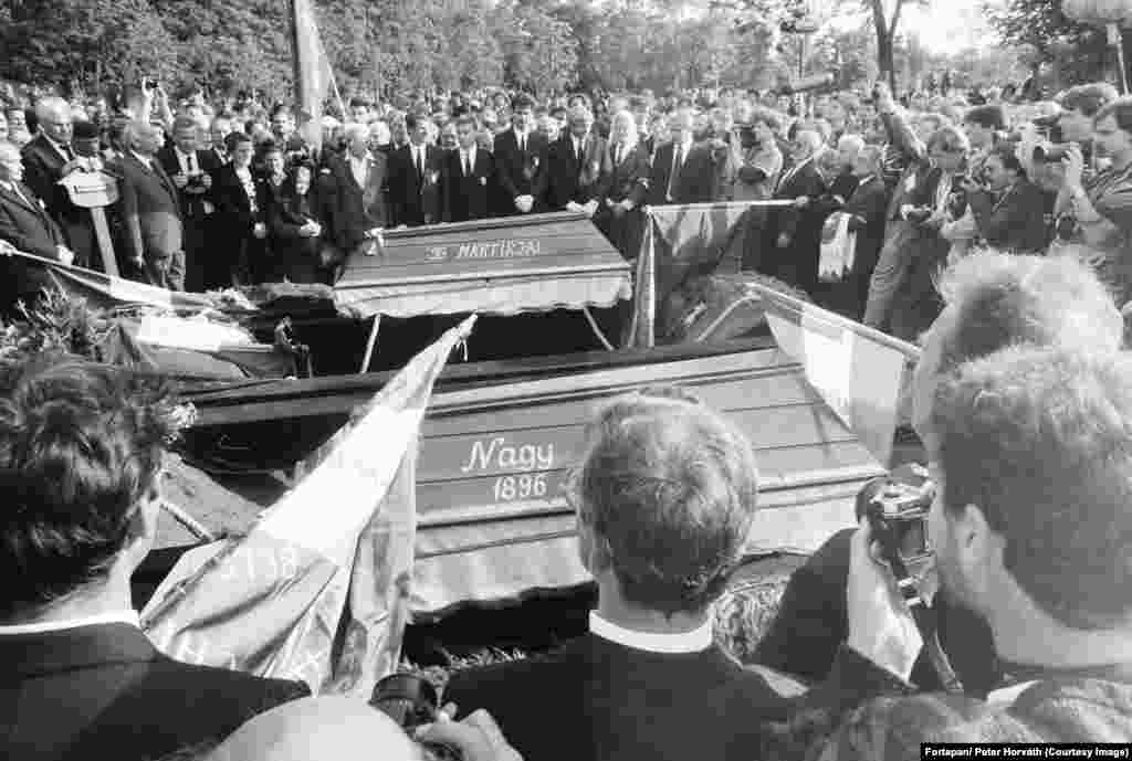 Mourners surround the coffin of Imre Nagy and another victim of the Soviet crackdown on Hungary&#39;s 1956 revolutionaries.&nbsp; In June, tens of of thousands of people gathered as Imre Nagy, the former communist prime minister of Hungary was reburied with full honors. Nagy had sided with the revolutionaries in Hungary&rsquo;s 1956 anti-communist uprising. &nbsp;