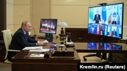 Russian President Vladimir Putin attends an extraordinary meeting of the Council of the Collective Security Treaty Organization (CSTO) via video link at the Novo-Ogaryovo state residence outside Moscow on January 10.