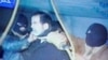 A video from Iraqi state television shows former Iraqi President Saddam Hussein moments before being hanged