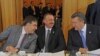 Georgian President Mikheil Saakashvili (left), Azerbaijani President Ilham Aliyev, and Ukrainian President Viktor Yanukovych confer during the EU's Eastern Partnership summit in Warsaw.