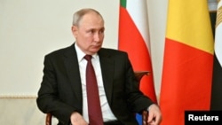 Vladimir Putin la discuția de sâmbătă cu președintele sud-african Cyril Ramaphosa.