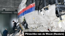 The reconstruction of the MH17 wreckage, as part of the trial, on display in Reijen, Netherlands, on May 26.