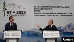 Кіраўнік Банка Канады Тыф Маклем і міністар фінансаў Канады Франсуа-Філіп Шампань на прэс-канфэрэнцыі падчас сустрэчы міністраў фінансаў і кіраўнікоў цэнтральных банкаў краін «Вялікай сямёркі» ў Банфе, Канада, 22 траўня 2025