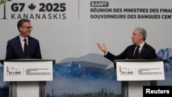 Guvernatorul Băncii Canadei, Tiff Macklem, și ministrul canadian de Finanțe, Francois-Philippe Champagne, la reuniunea miniștrilor de Finanțe și guvernatorilor băncilor centrale din G7, Banff, Alberta, Canada, 22 mai 2025. 