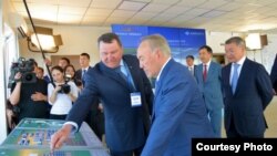 Kazakhstan. Nursultan Nazarbayev visited the construction site of the auto-industrial cluster AZIA AVTO in Ust-Kamenogorsk. June 29, 2016.
